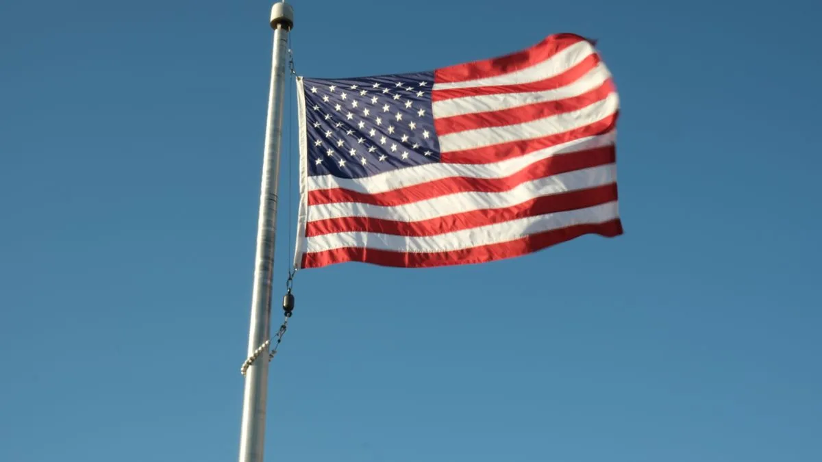 Flagpole against sky