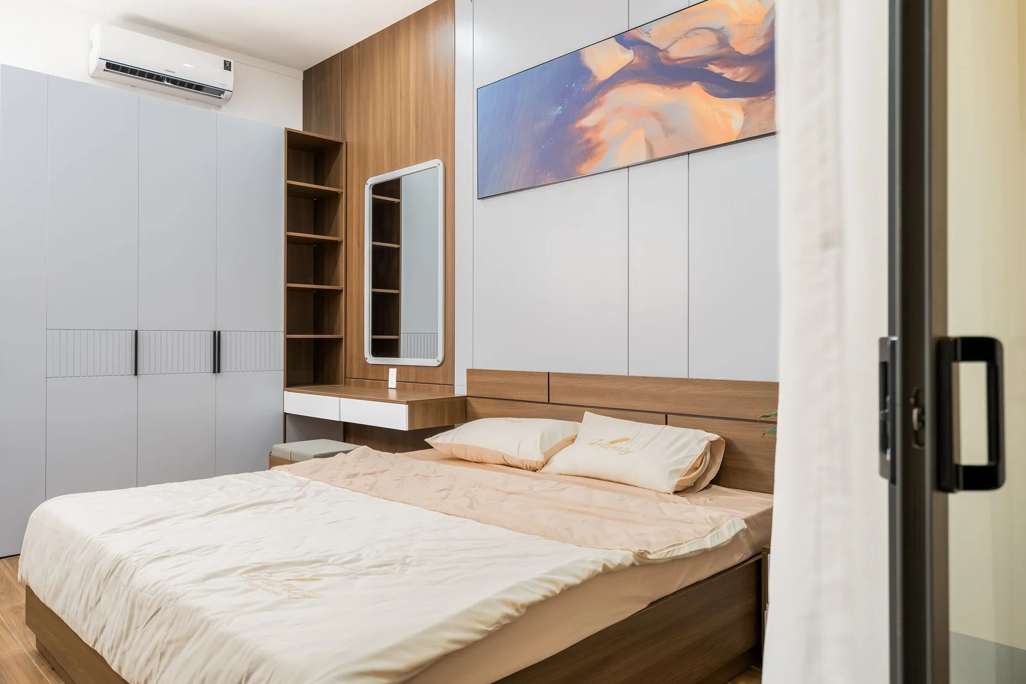 Warmly lit guest bedroom